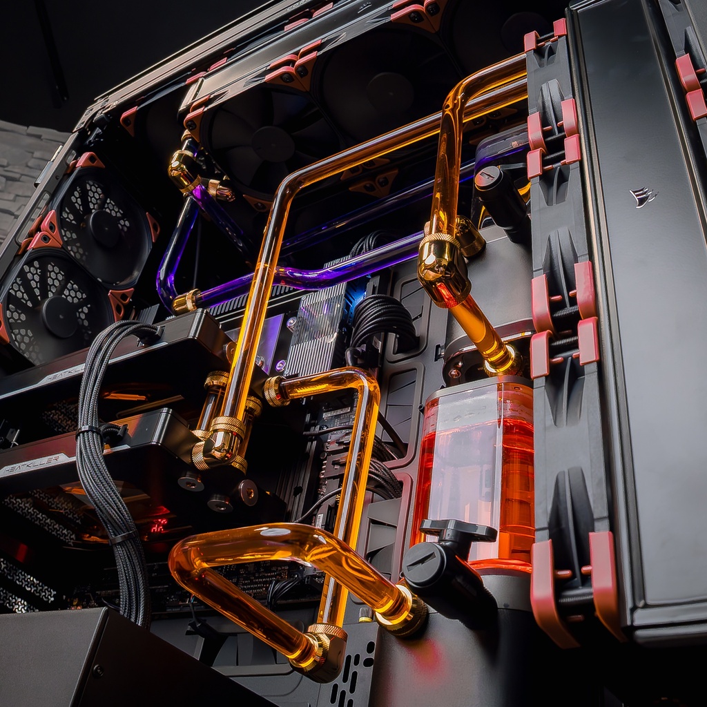 Circuit watercooling custom PC TITAN X double RTX 5090 avec tubes rigides RGB et réservoir liquide haute performance