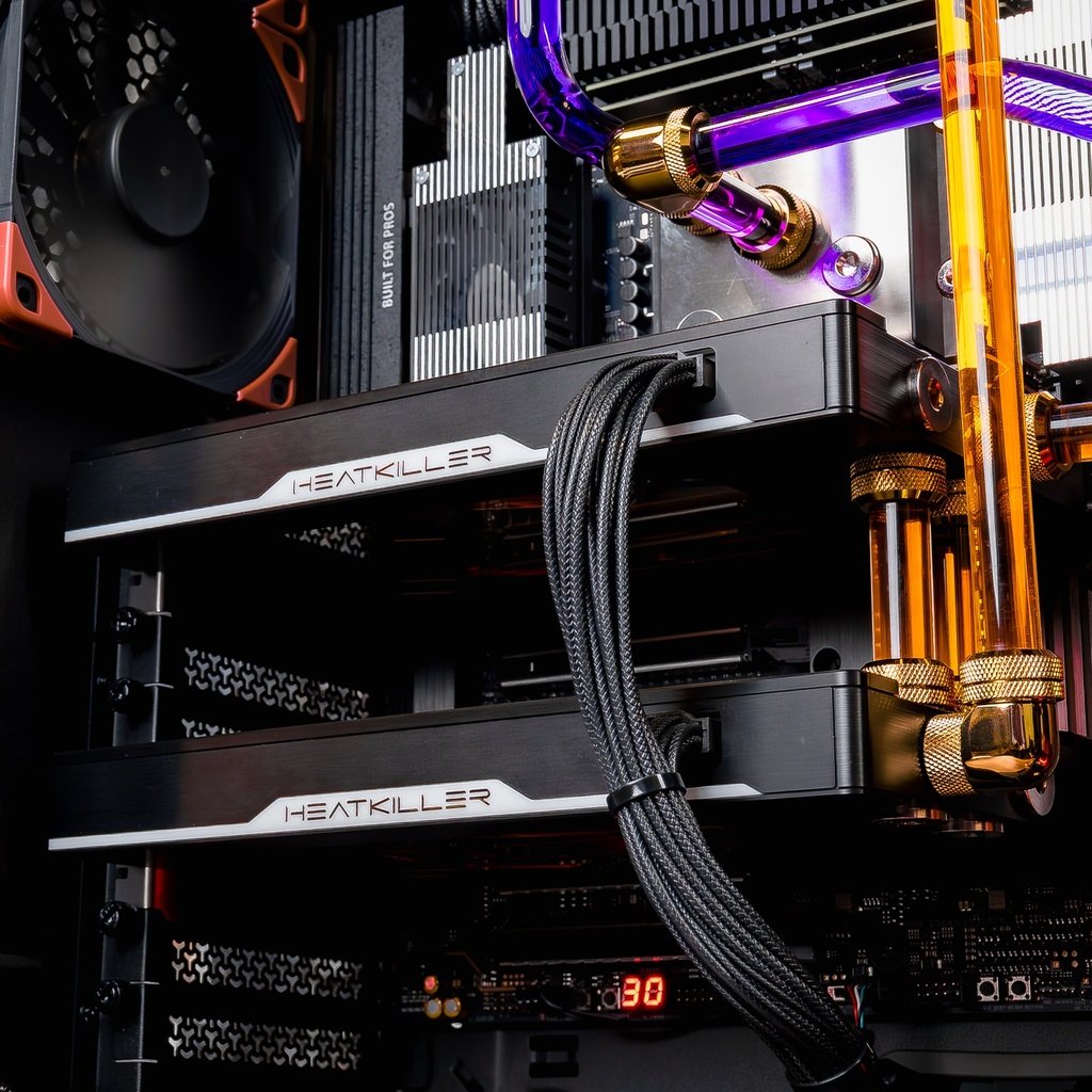 Double RTX 5090 Heatkiller watercooling custom PC TITAN X avec Threadripper 7960X ultra performante